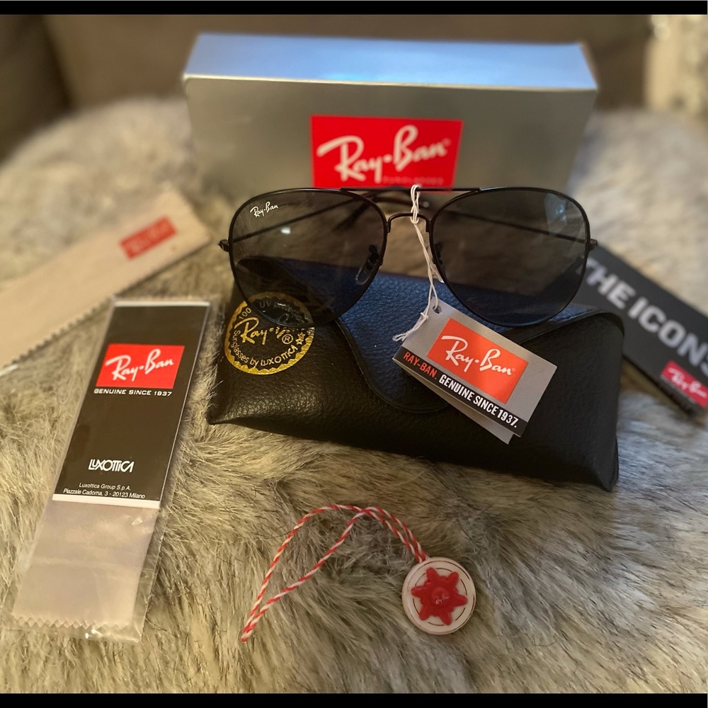 Ray Ban SunGlasses  ( Black) with Carrying case, box, and tags.